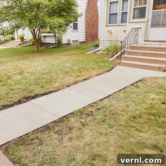 DIY Sidewalk Transformation: Easier Than You Imagine 3 Smooth, uniform concrete sidewalk after resurfacing with Sakrete Flo-Coat