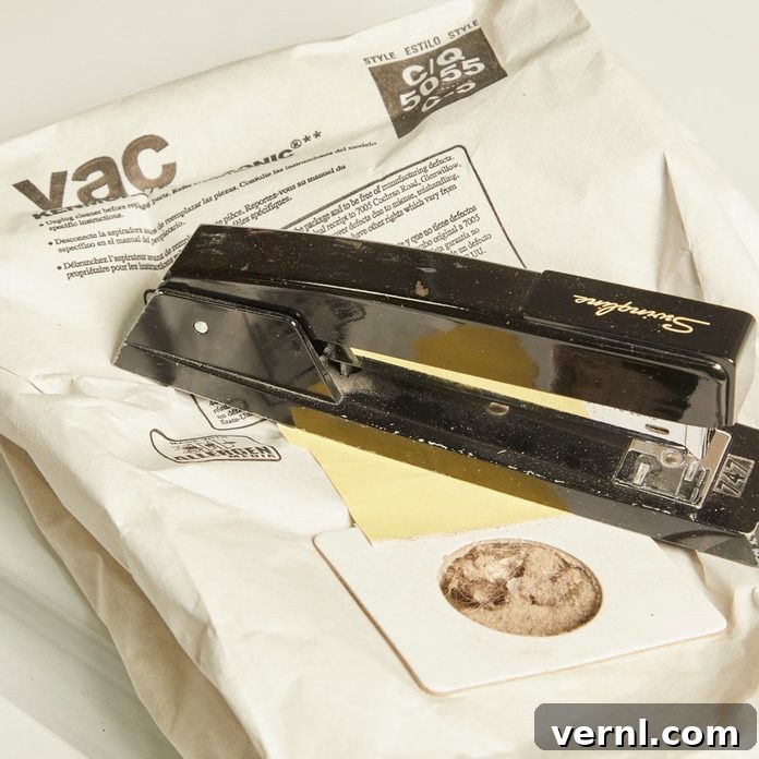 Give Your Vacuum Bags a Second Life: Smart Reuse Tips 2 HH Handy Hint reuse vacuum cleaner bags stapler - illustrating the method