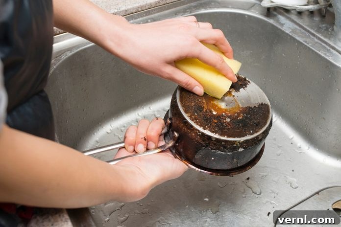 scrubbing burnt pan