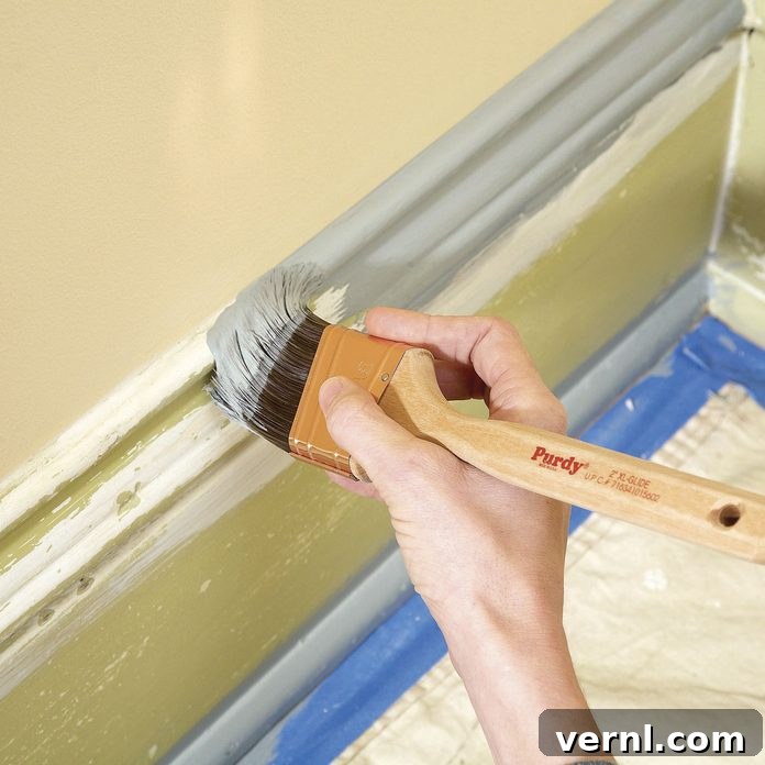 Your Ultimate Guide to Paint Brush Selection 2 paint brush cutting in trim