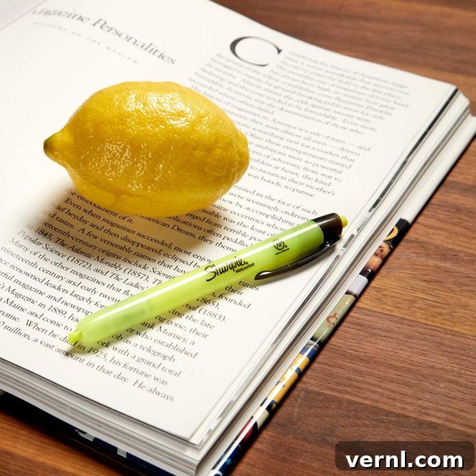 Lemon and cotton swab ready to remove highlighter stains from paper