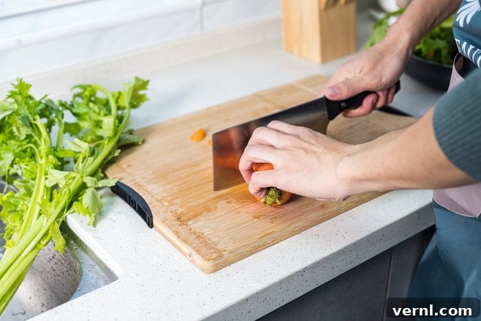 Quartz Countertop Care Secrets Revealed 3 using chopping board on quartz counter top