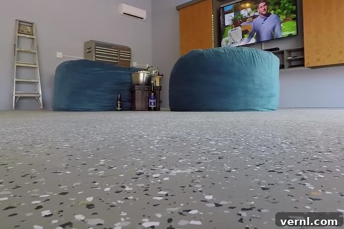 Shiny epoxy floor coating transforming a garage into an inviting space