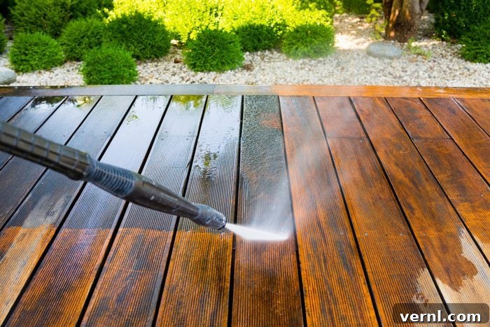 Unlock a Spotless Deck: Top Tools and Techniques for Composite Surfaces 3 cleaning terrace with a pressure washer