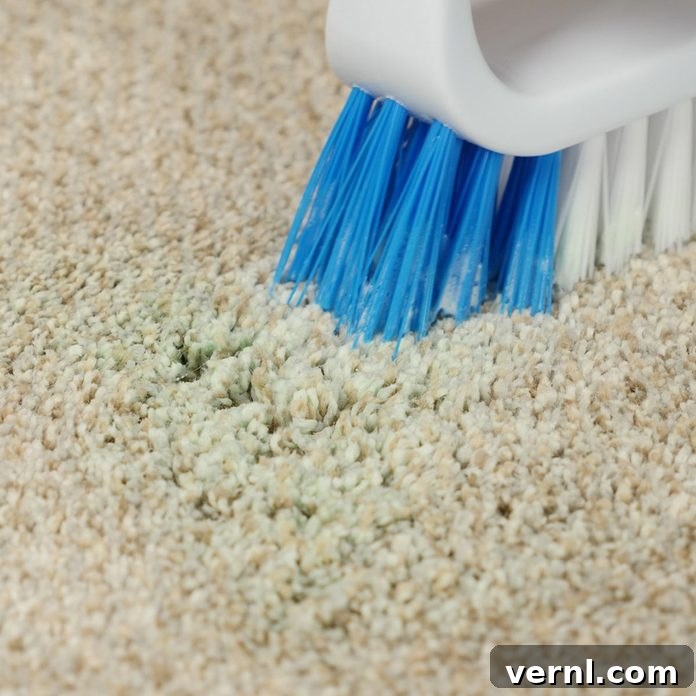 Scrubbing slime stain out of carpet