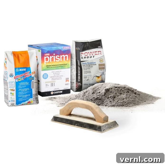 Mastering Grout Choice for Lasting Beauty 4 A close-up shot of perfectly grouted tiles with dark, uniform grout lines.