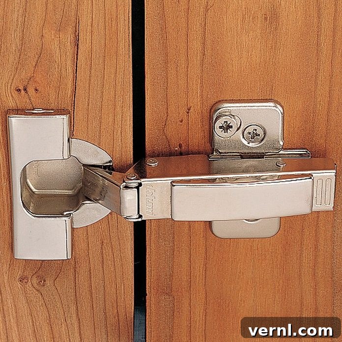 Concealed Hinges: The Ultimate Guide 3 Half overlay hinge: Two adjacent cabinet doors share a single vertical cabinet partition, with each door partially covering a portion of that partition.