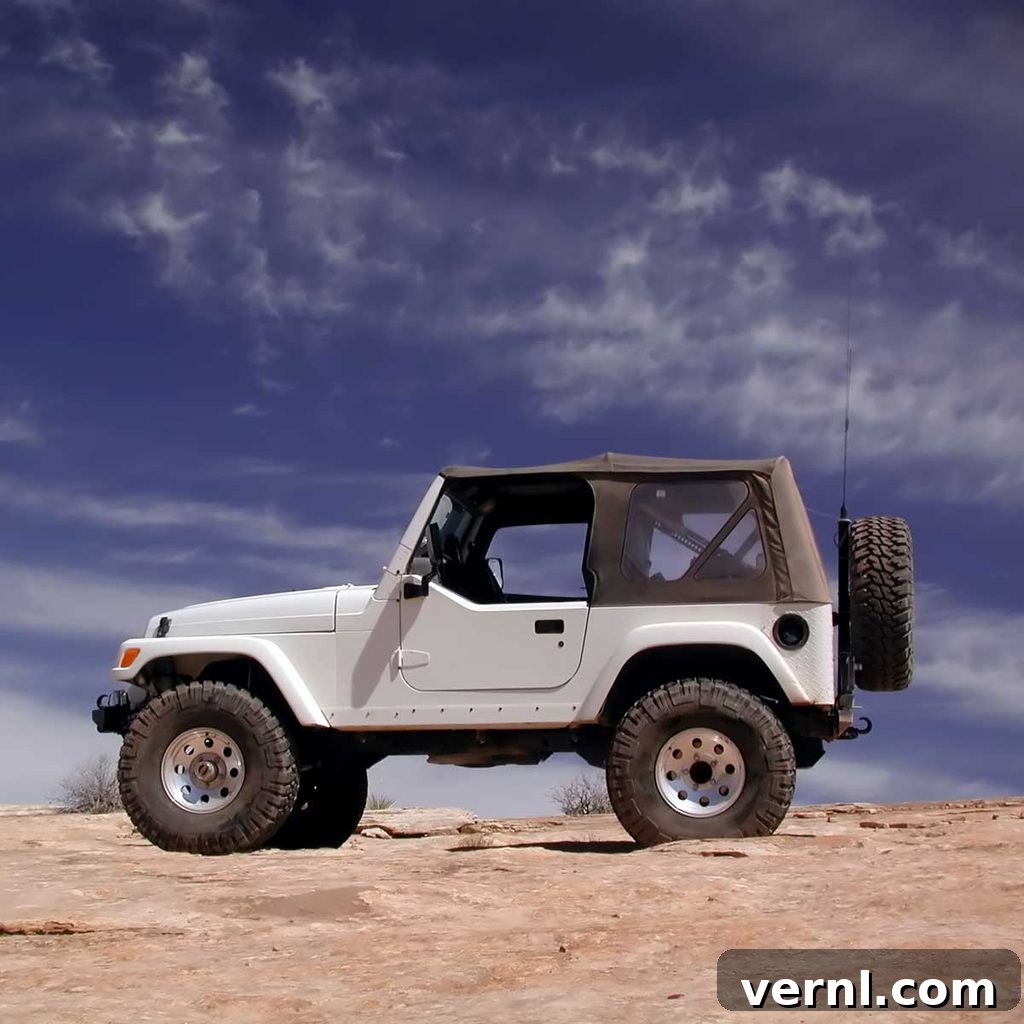 10 Cars That Defy Depreciation 2 Jeep Wrangler driving off-road, symbolizing excellent resale value
