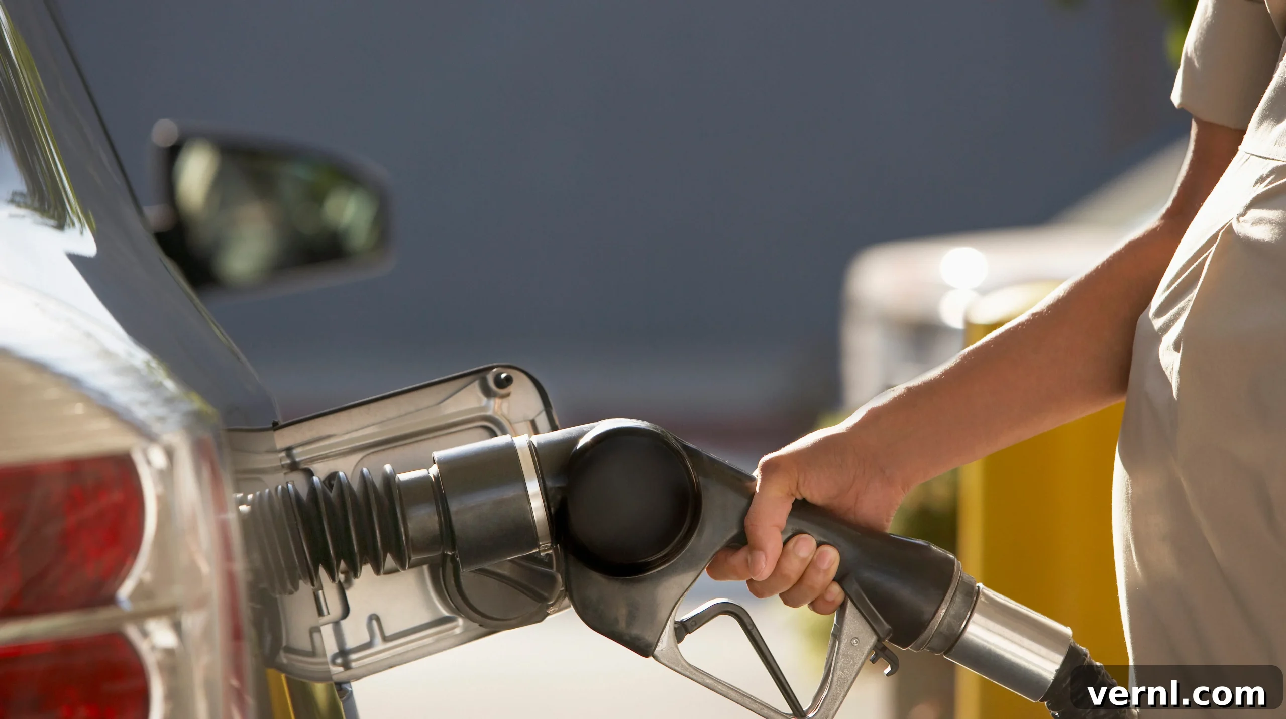 The Ingenious Mechanism of Gas Pump Auto-Stop 2 Woman pumping gas
