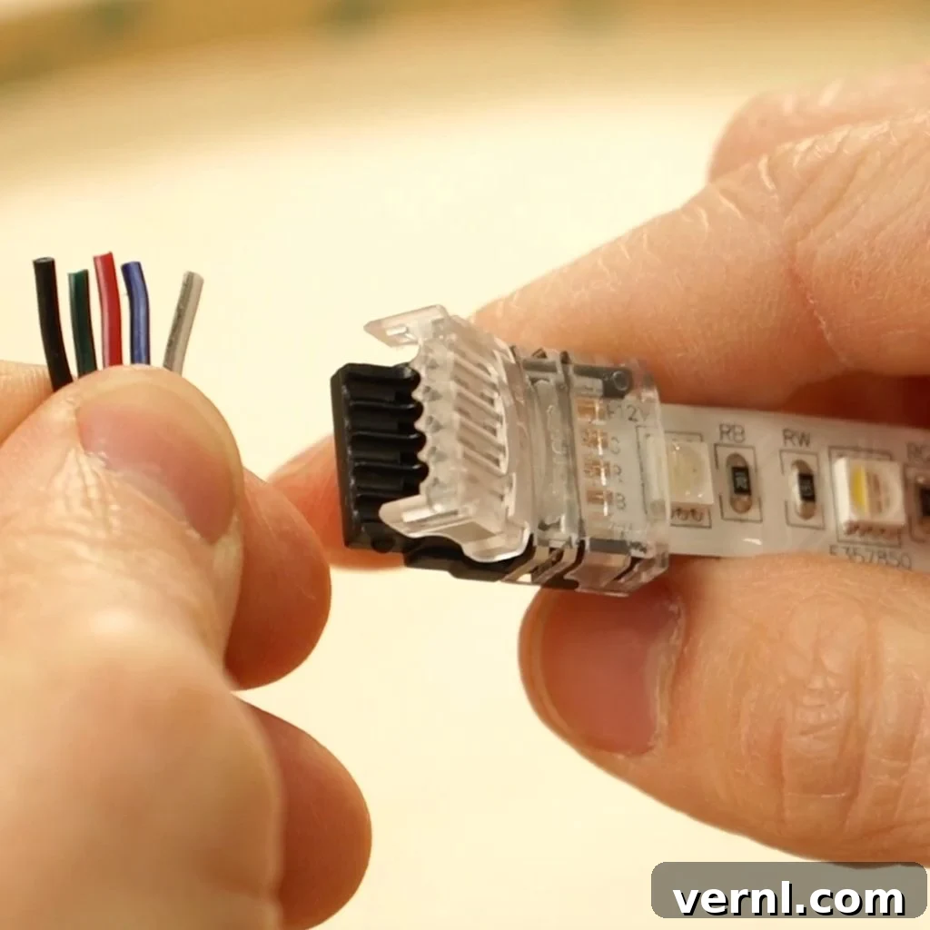 Illuminate Your Space: A Complete Guide to Buying and Installing LEDs 3 Connecting Wires to LED Strip with Clamp