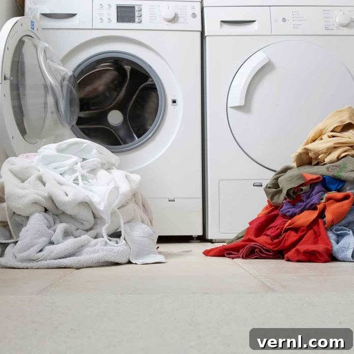 Sorted laundry waiting to be washed, highlighting the moisture produced by laundry activities.
