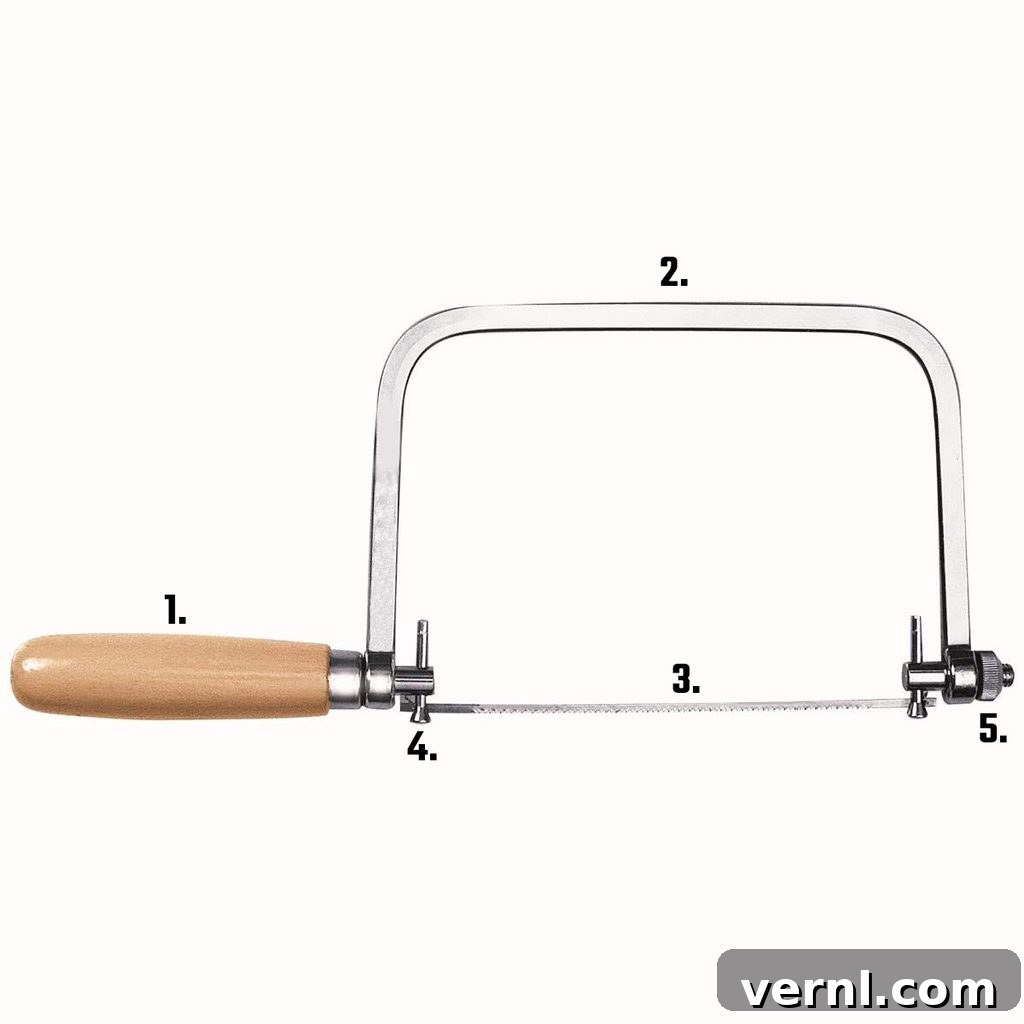 A close-up image of a coping saw blade, demonstrating its flexibility and fine teeth, ready for intricate cuts.