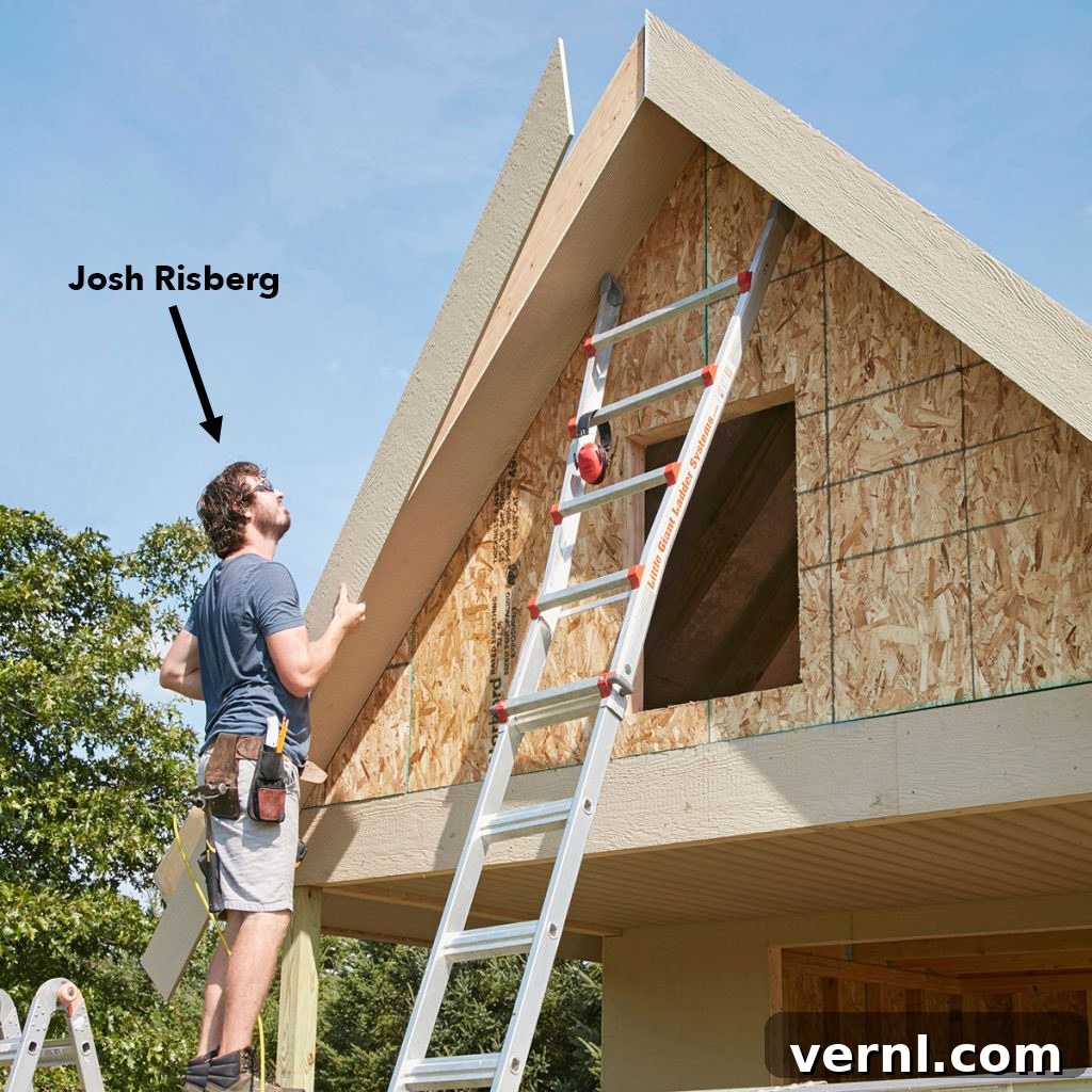 Rookie Carpenter Wisdom: 5 Things I Learned the Hard Way 2 carpenter lining up a long piece of exterior trim