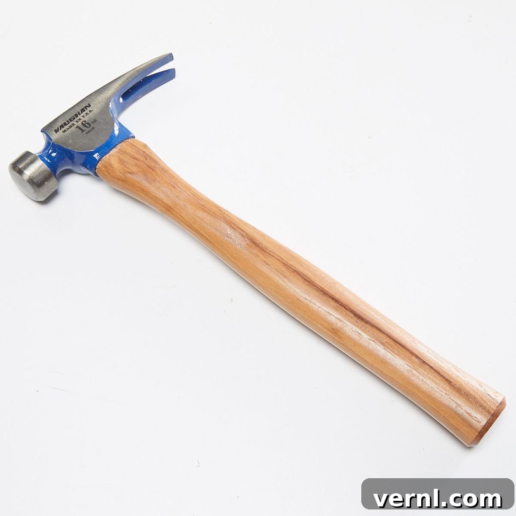 A hammer with a wooden handle | Construction Pro Tips