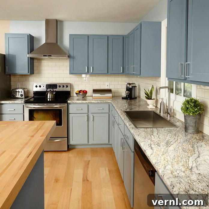 Modern kitchen counter with various small appliances plugged into outlets, highlighting the need for robust electrical circuits.