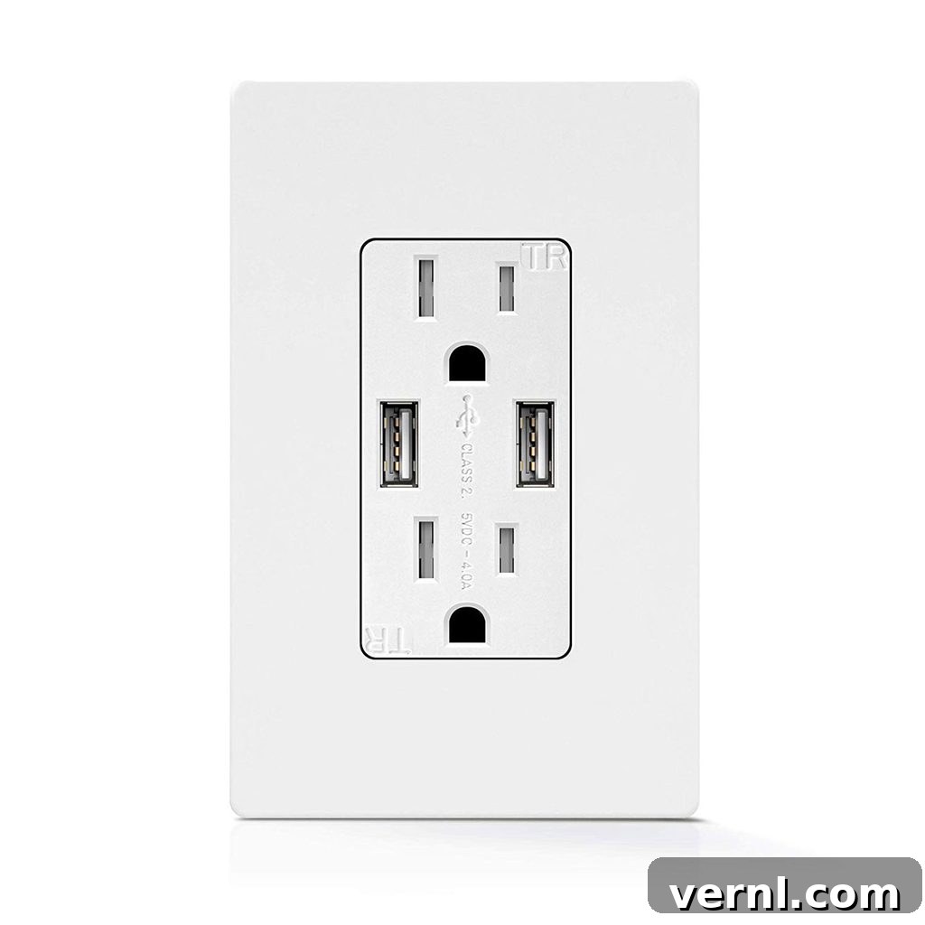 A wall outlet features two standard plug sockets and two USB ports, designed for powering devices in a household or office setting.
