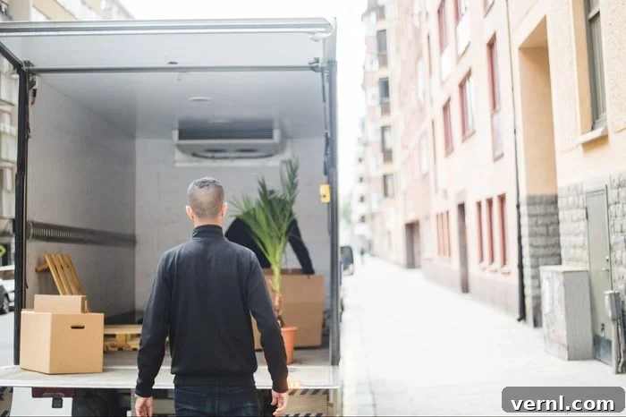 Man mover standing confidently against a moving truck in a well-lit urban street, illustrating smart parking choices for security