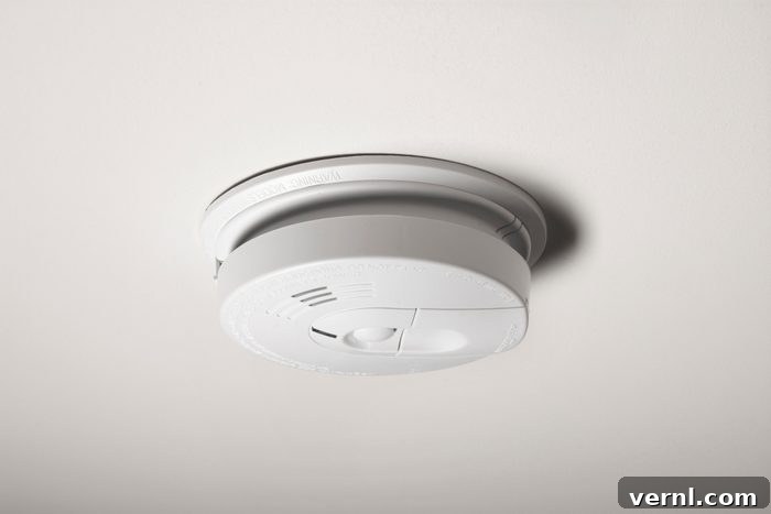 Hardwired vs Battery Smoke Alarms What Sets Them Apart 2 Smoke Detector on the ceiling inside a home