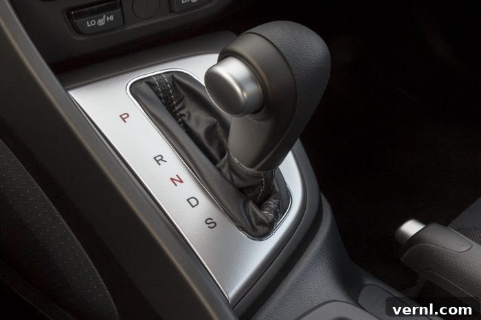 When to Manually Downshift Your Automatic 2 automatic transmission gear stick inside car