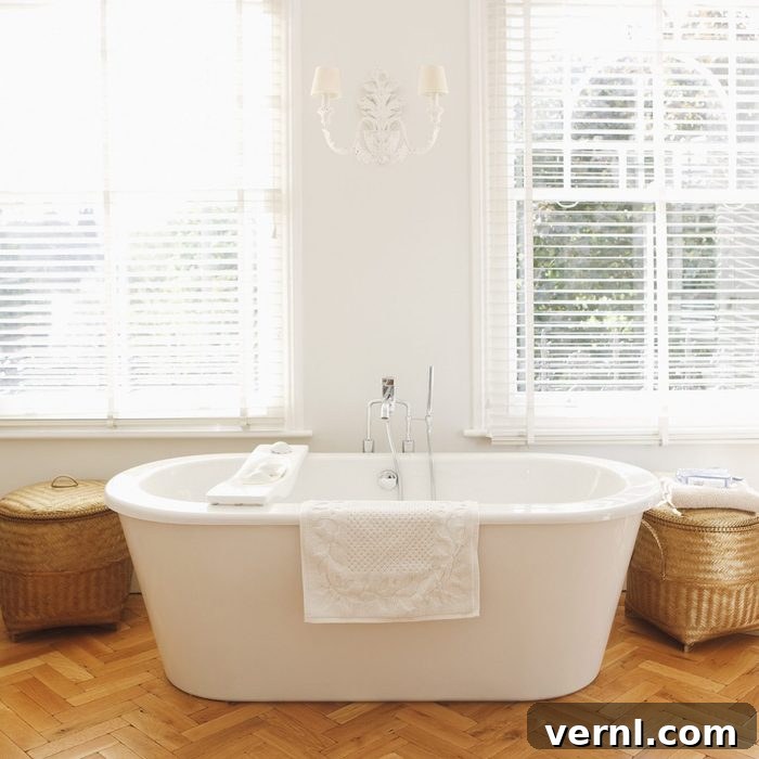 Your Essential Guide to Bathtubs 2 freestanding bath tub in bathroom near windows