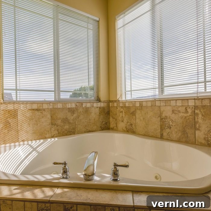 Your Essential Guide to Bathtubs 3 Jetted corner bathtub in modern home