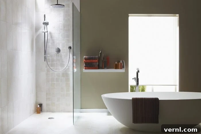 Discover 16 Shower Types for Your Dream Bathroom 2 Interior of bathroom with walk in shower and freestanding bath tub
