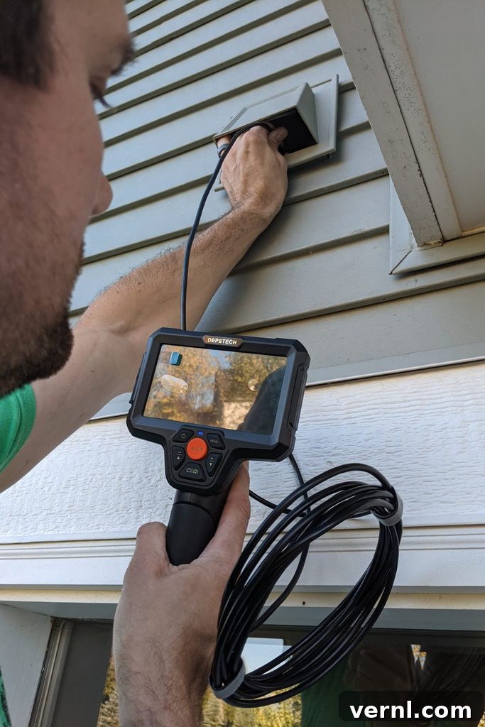 Why Every DIYer Needs This Surprisingly Useful Endoscope 3 Inspecting a dryer vent for lint and debris with Depstech DS500 endoscope
