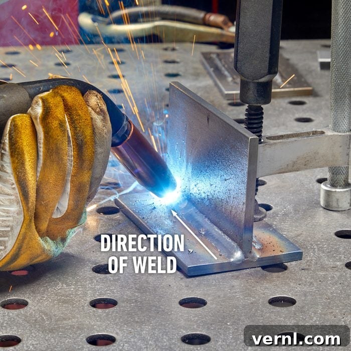 Unlock Expert MIG Welding: Insider Tips from a Master 5 Welder preparing to weld a 90-degree joint with a magnetic jig.