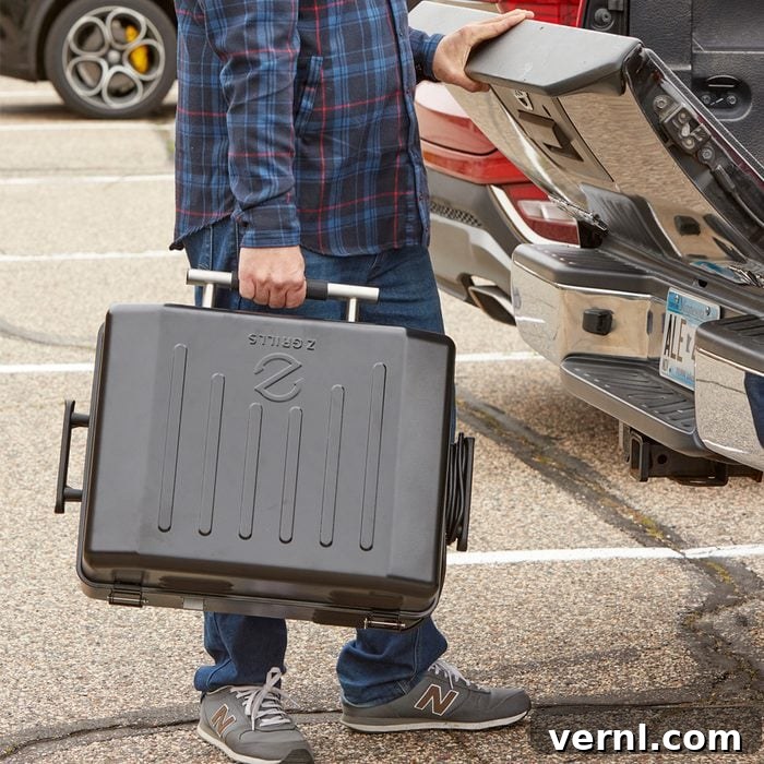 Z-Grills Cruiser 200A Portable Pellet Grill in use, showcasing its compact design and smoking capabilities.