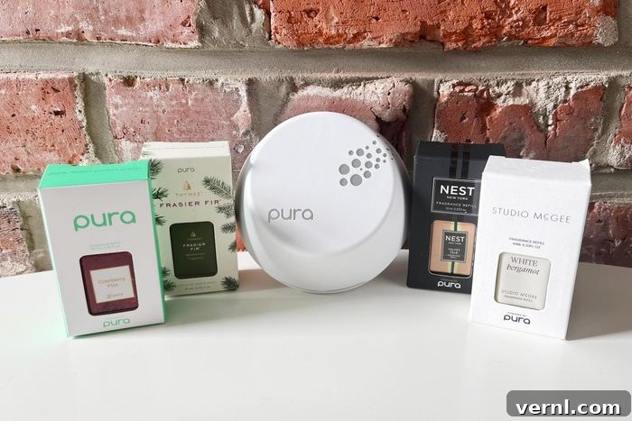 Pura Home Fragrance device, scent vials, and accessories