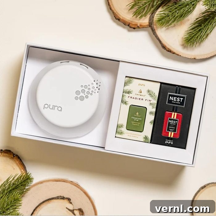 Pura Home Fragrance device and winter scent vials