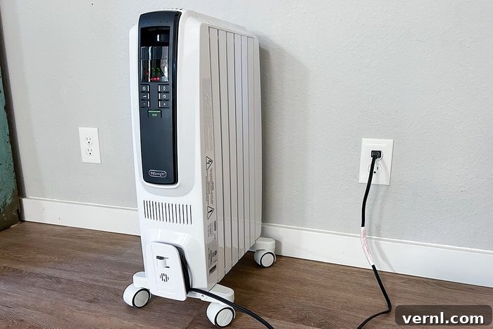 Electrician-Approved: The 3 Safest Space Heaters for Your Home 8 DeLonghi Dragon Digital Full Room Radiant Heater positioned safely in a room