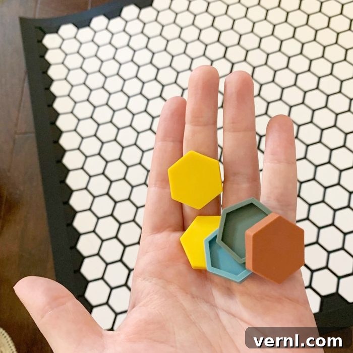 Tile Mat pieces in a hand