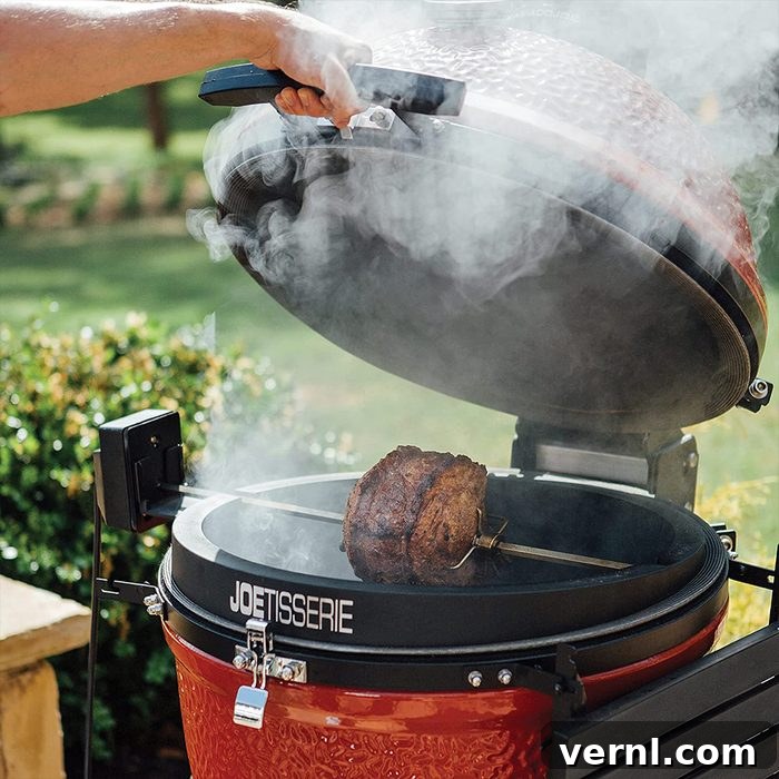 Joetisserie The Ultimate Grilling Game Changer 2 Joetisserie on a smoker with a chicken