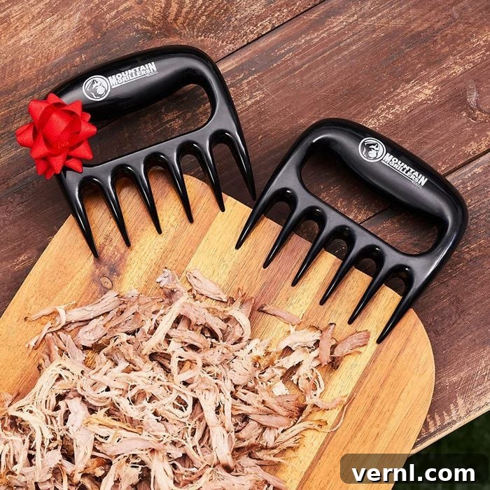 Meat Claws Shreds Meat Effortlessly Straight From the Grill 2 Mountain Grillers Meat Claws in action, effortlessly shredding pork.