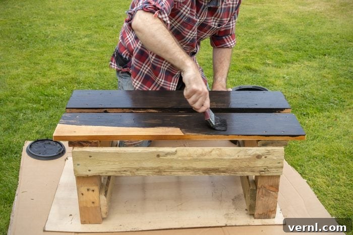 DIY Projects for New Homeowners 3 Man painting a garden bench