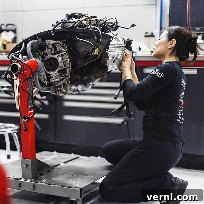 Wrenching Stereotypes: Nhu Nguyen, An Automotive Restoration Pioneer 3 Nhu Nguyen working on restoring a car