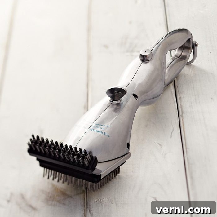 Steam Grill Brush Melts Away Stuck Food 2 Grand Grill Daddy Steam Cleaning Grill Brush in use