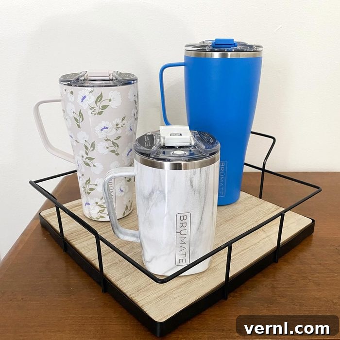 Three different BruMate Toddy XL mugs in various colors