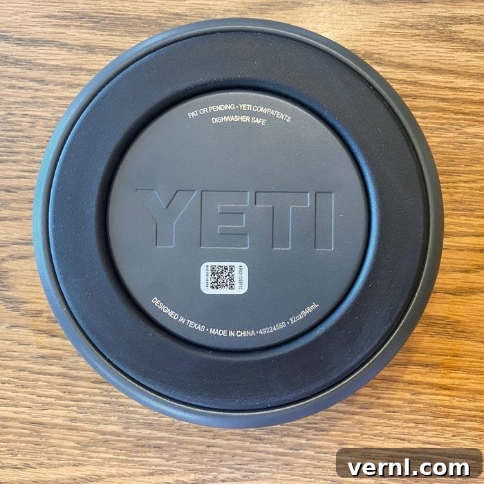 Close-up of the bottom of a Yeti Dog Bowl, highlighting the non-slip rubber base and brand logo.