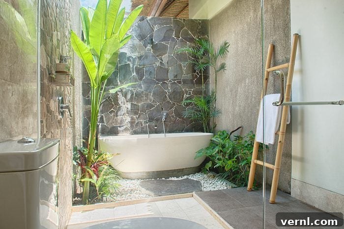Unpacking the Tomatocore Aesthetic 3 Luxury Interior Tropical Bathroom Of The Dream with a Bathtub and open ceiling, tropical plants and gravel surround the tub with the toilet and showerr glass in the foreground