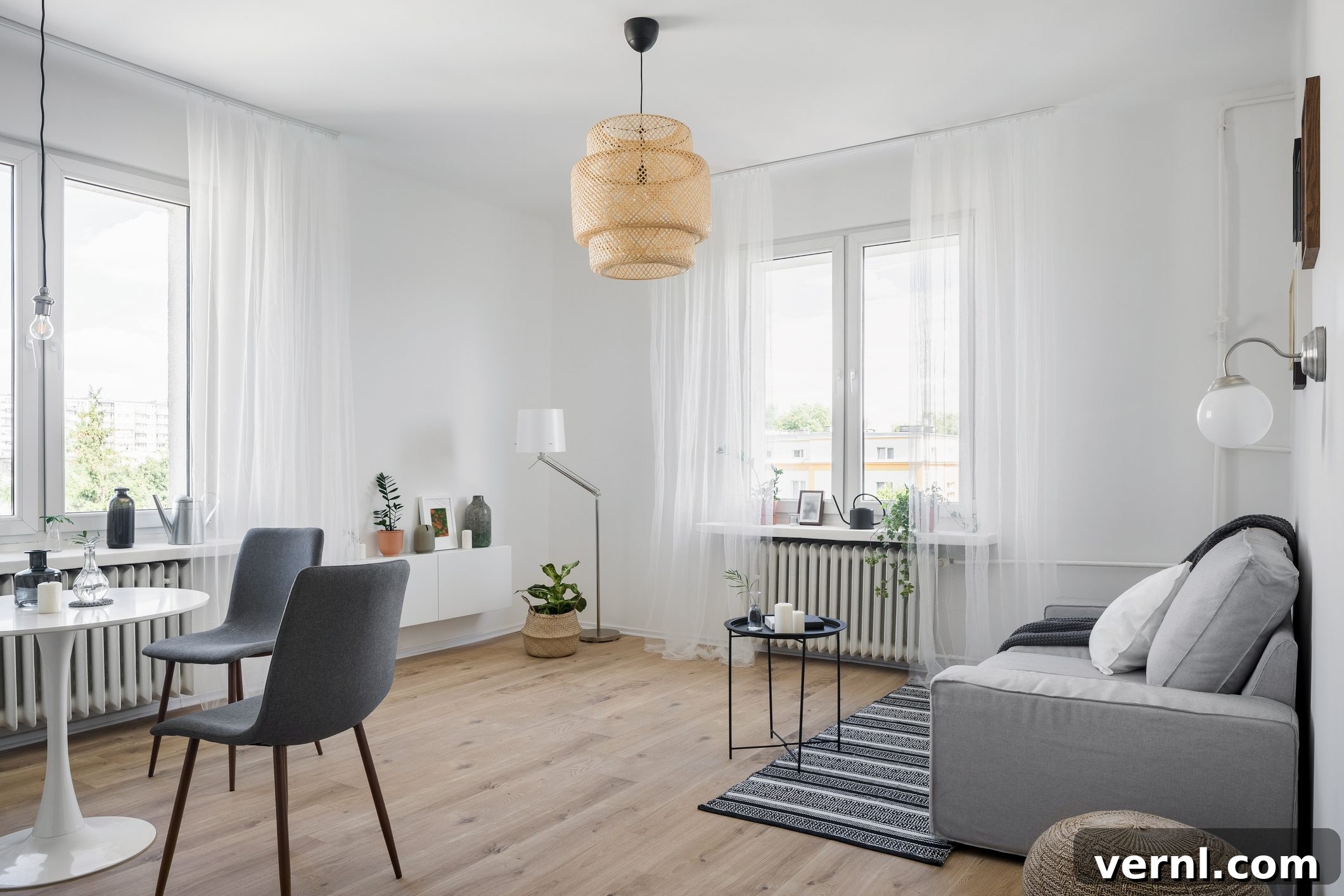 Small Space, Big Style Living Room Decor Hacks 5 Cozy apartment living room with large window and sheer curtains