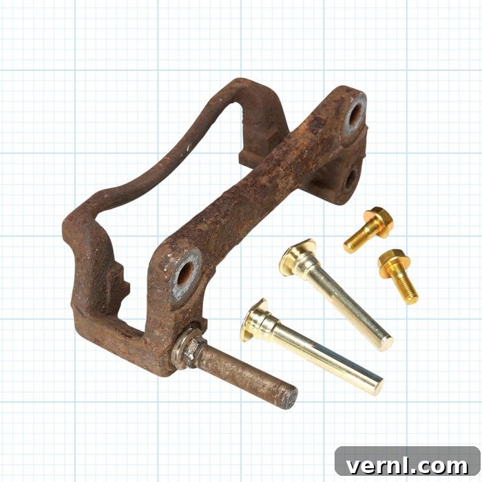 Everything You Need to Know About Brake Pad Replacement and Repair 2 Brake caliper pins on FHM ocean screen grid background