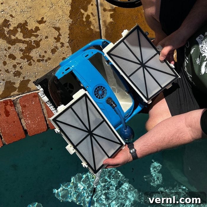 Dolphin Nautilus Robotic Pool Cleaner Editor's Hands-On Review 4 Inserting filter in Pool Cleaner