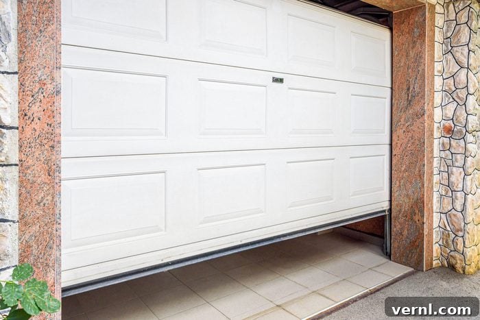 Solving the Mystery of Your Self-Opening Garage Door 2 Halfway Open Garage Door
