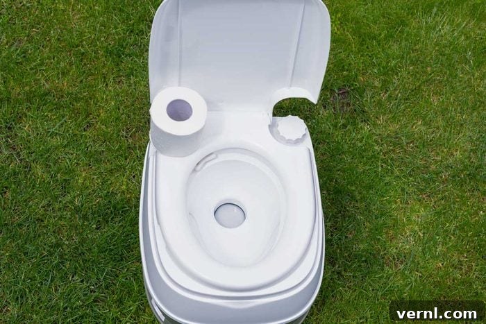 The Ultimate Guide to Composting Toilets 2 Overhead of Bio Portable Camping Toilet outdoors in a green grass area