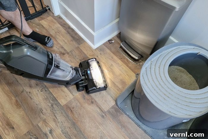 Using vacuum to clean wooden floor