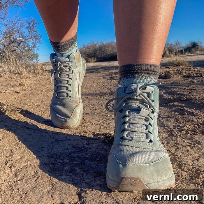 As an Avid Hiker, I Choose Altra Lone Peak for Every Trail 2 Altra Lone Peak Hiker boots on a trail