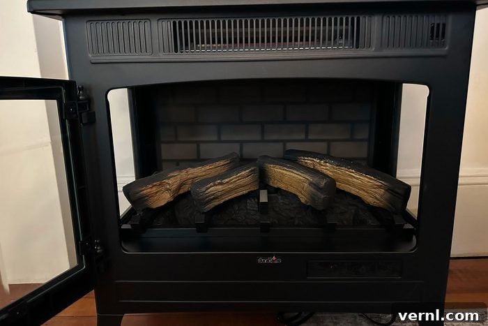 Inside of Duraflame electric fireplace with heating element visible