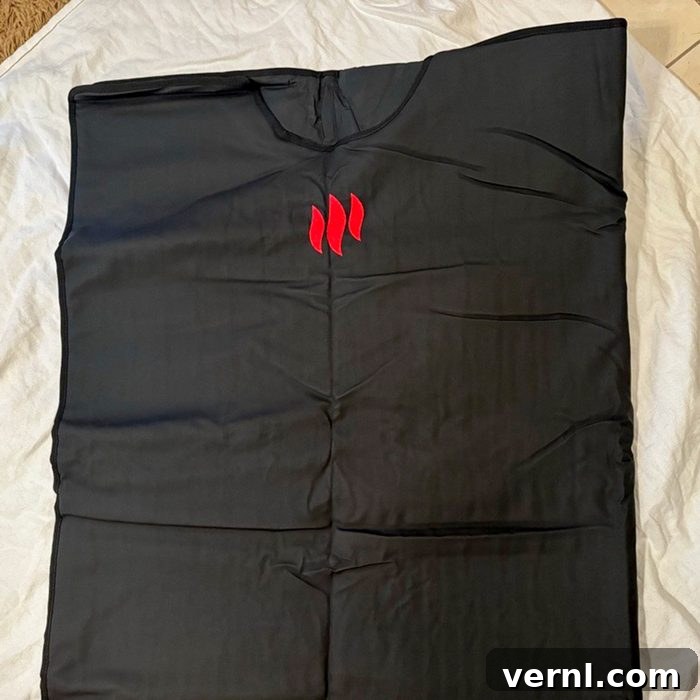 MiHIGH Sauna Blanket We Melted Into a Warm Relaxing Cocoon 2 MiHIGH Infrared Sauna Blanket unfolded on a floor, ready for use, highlighting its design and size.